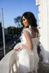 Wedding dress with feathers